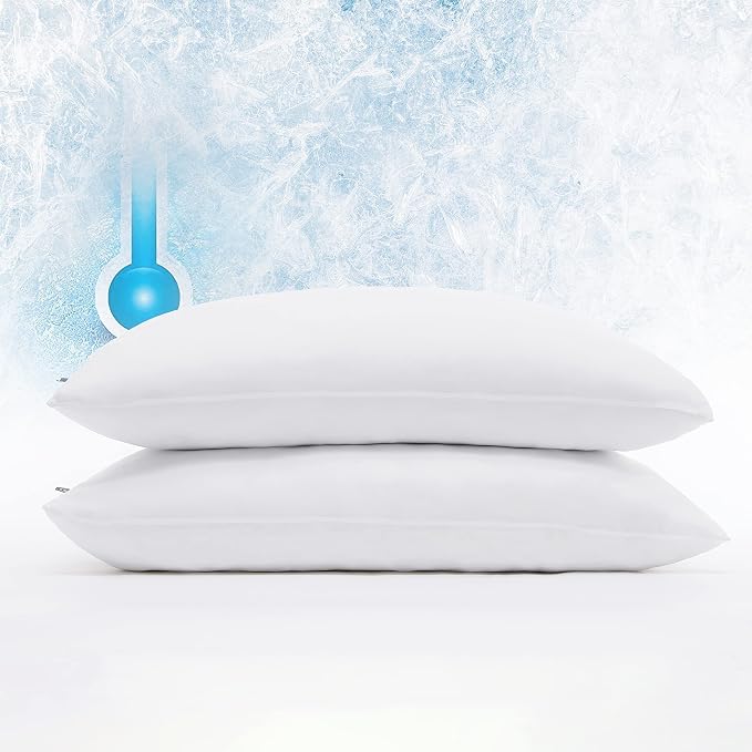 Two soft pillows with a blue temperature gauge on top, showcasing the Serta Power Chill Cooling Pillow for comfort.