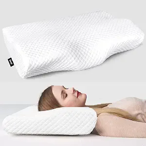 A woman rests her head on a ZAMAT Contour Pillow for Neck Pain, enjoying comfort with the same pillow beneath her.